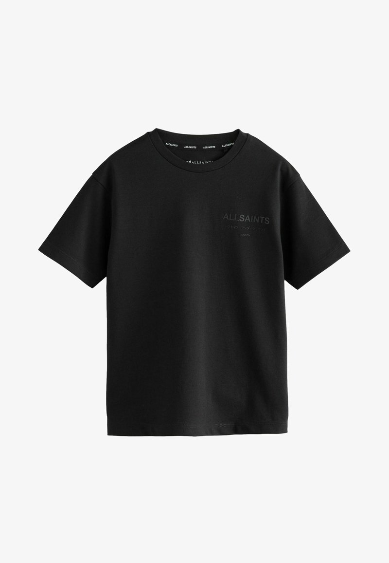 Melnas kokvilnas T-krekls ar apaļu kakla izgriezumu un īsām piedurknēm. Iezīmēts ar smalku tonālu logo kreisajā krūtīs. Mīksta tekstūra, brīva piegriezuma.