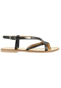 Sorte læder sandaler med fletstraps og spænde lukning. Flad sål med en naturlig læder indlægssål og lyst brunt ydersål.