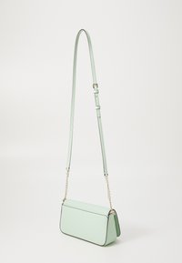 Mint green crossbody bag with a sleek rectangular shape, textured material, a chain-accented strap, and black trim details.