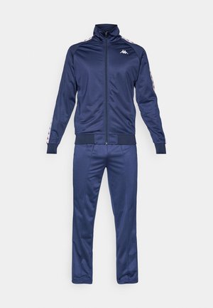 Marine trainingspak van soepel polyester; jack met rits en hoge kraag, gestreepte accenten, bijpassende broek met elastische boorden.