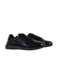 Sneakers neri con tomaia in pelle liscia, chiusura con lacci e zip laterale. Presentano una suola in gomma testurizzata per una migliore aderenza.