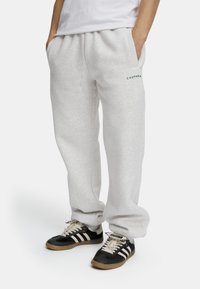 Caspara JOGGERS - Joggebukse - grey melange