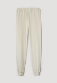 Krémové kalhoty s elastickým pasem a zúženými kotníky. Vyrobeny z měkké látky s hladkým povrchem a bez viditelných vzorů či ozdob.