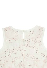 Weißes ärmelloses Kleid mit einem Reißverschluss und Knopfverschluss auf der Rückseite, verziert mit pinken Pailletten und floralen Mustern im gesamten Kleid.