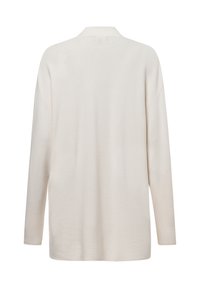 Langwerpige, crèmekleurige geribde cardigan met een relaxte pasvorm. Beschikt over een subtiel textuurpatroon en een lichte v-hals kraag.