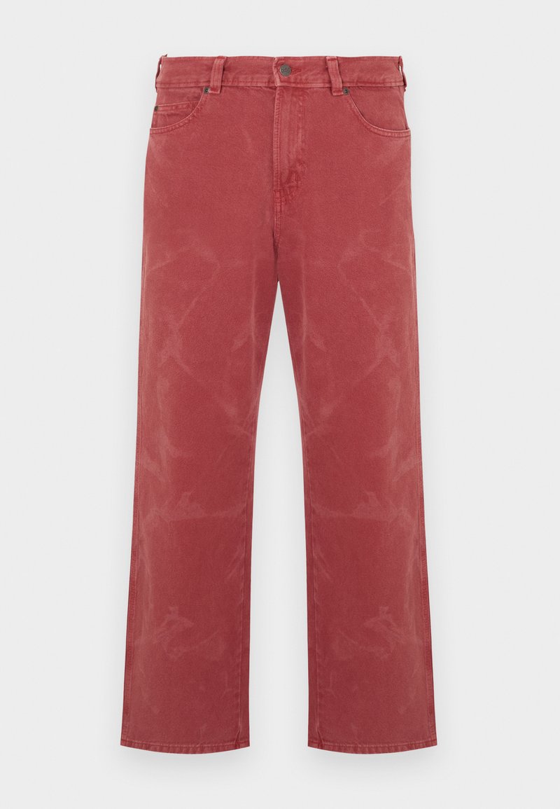 Red denim jeans with a relaxed fit, featuring a five-pocket design, visible stitching, and subtle faded accents throughout.