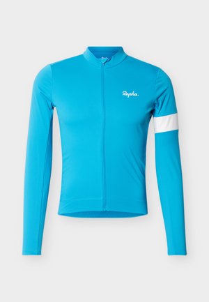 Langärmliges, leuchtend blaues Radtrikot mit durchgehendem Frontreißverschluss, einem weißen Streifen am rechten Ärmel und kleinem Rapha-Logo auf der Brust.