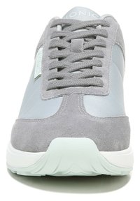 Grey athletic shoes with a suede and mesh upper, rounded toe, flat laces, and light-colored rubber sole. Features a textured design.