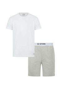 Weißes Baumwoll-T-Shirt mit kurzen Ärmeln und Rundhalsausschnitt, kombiniert mit hellgrauen Baumwollshorts mit elastischem Bund und G-Star-Logo.