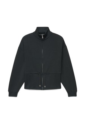 Veste noire à manches longues avec fermeture éclair, col montant et taille ajustable par cordon, présentée sur fond blanc.