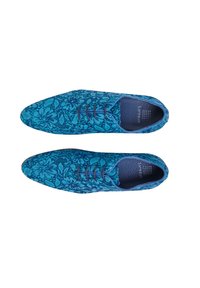 Blue floral lace shoes with pointed toe, matching laces, and textured interior. Design features floral pattern in varying blue shades.