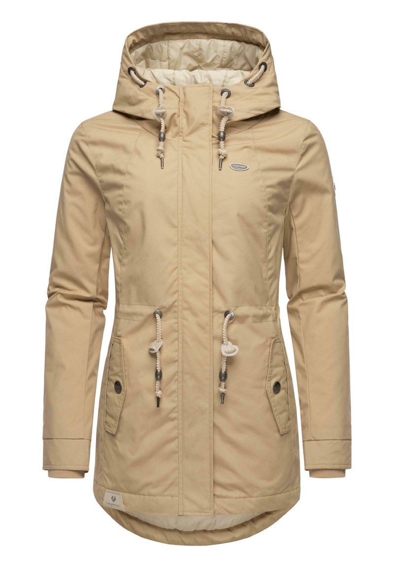 Beige waterproof jacket with a hood, drawstrings, two front pockets, and ribbed cuffs. Smooth texture with a slightly shiny finish.