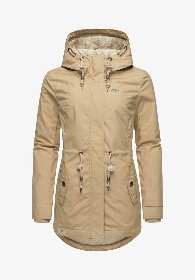 Beige nepromokavá bunda s kapucí, stahovacími šňůrkami, dvěma předními kapsami a žebrovanými manžetami. Hladký povrch s mírně lesklým zakončením.
