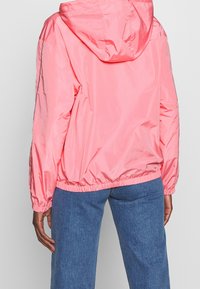 Tommy Hilfiger Lehká bunda - light pink