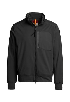 Veste softshell noire avec fermeture éclair frontale, col montant, poche poitrine zippée et poignets et ourlet côtelés.