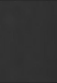 Une femme en pull jaune et un homme en chemise à carreaux sont assis sur un canapé en train de jouer à des jeux vidéo avec des manettes dans un salon.