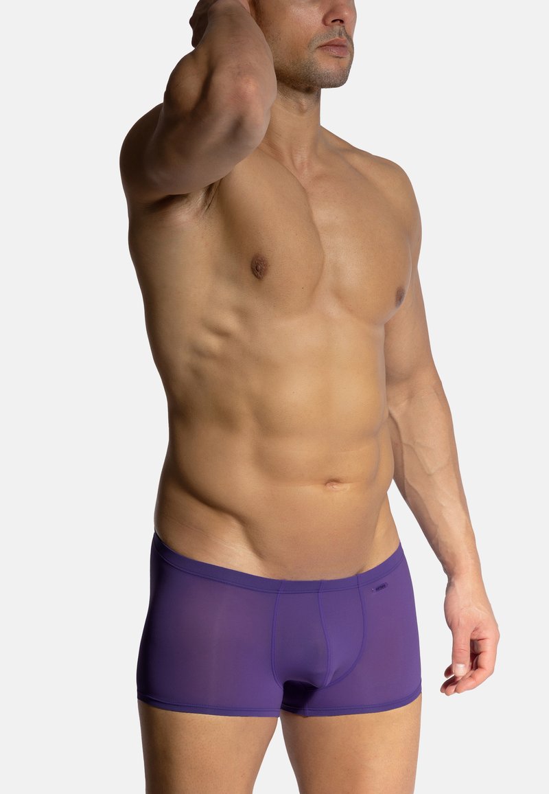 Purple boxer briefs with a smooth, stretchy fabric. Features a fitted design and a low-rise waistband. Minimal seams for comfort.