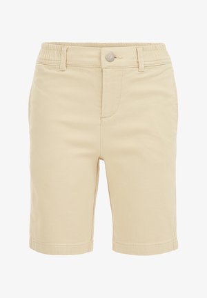 Beżowe spodenki do kolan wykonane z miękkiego materiału, z zapięciem na guzik i elastycznym pasem, bocznymi kieszeniami oraz starannie obszytymi krawędziami.