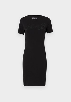 Black cotton t-shirt dress with short sleeves, featuring a fitted silhouette and "VERSACE JEANS COUTURE" logo in rhinestones across the chest.