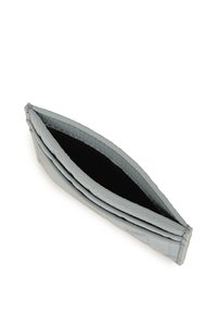 Light grey textured clutch bag with a smooth finish, featuring a black interior and an open top. The design includes folded edges.