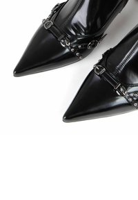 Miriade Tronchetti - nero