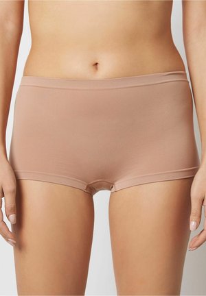 Sous-vêtements de style hipster de couleur beige, fabriqués en tissu lisse et extensible. Présentent une large ceinture et une silhouette ajustée, adaptés pour un usage quotidien.
