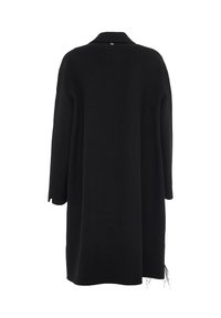 Cappotto nero oversize con colletto, maniche lunghe e taglio dritto. Presenta uno spacco posteriore, una consistenza morbida e nessuna chiusura visibile.