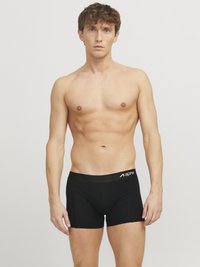 Schwarze Boxershorts mit einfarbigem Design, aus dehnbarem Stoff, mit einem breiten elastischen Bund und einem Logo-Druck.