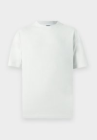 Ανοιχτό πράσινο βαμβακερό t-shirt με άνετη γραμμή, κοντά μανίκια και ριμπ λαιμόκοψη. Χωρίς σχέδια ή επιπλέον διακοσμητικά στοιχεία.