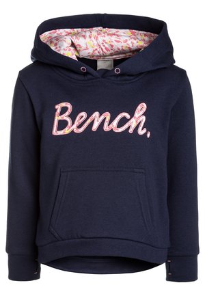 Mørkeblå hættetrøje med frontlomme, hættens for er foret med blomsterprint, og "Bench."-logo i pink blomsterskrift på brystet.