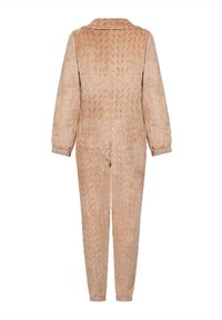 Svetlohnedý, štruktúrovaný overal s dlhými rukávmi, golierom a látkou s vzorom pripomínajúcim listy, s priliehajúcimi manžetami a členkami.