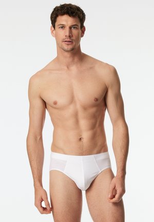 Weißer Baumwollslip mit enganliegendem Design und weicher Textur. Verfügt über einen elastischen Bund und eine einfache, nahtlose Konstruktion für hohen Tragekomfort.