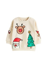 Beżowy sweter z festywnymi grafikami: renifer, Święty Mikołaj, choinka i piernikowy ludzik w żywych kolorach. Rękawy i dół są prążkowane.