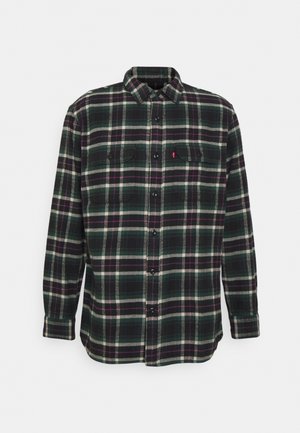 Camicia in flanella con bottoni a maniche lunghe, a quadri verdi, neri, bianchi e viola, con due tasche sul petto.