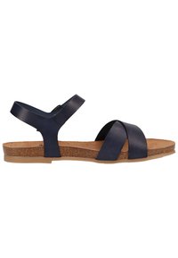 Marineblaue Leder-Sandalette mit Korkfußbett, Merkmale von Kreuzriemen und Knöchelstütze. Flache Sohle mit strukturiertem Oberflächen.