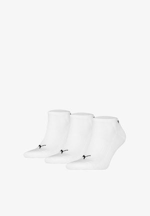 White ankle socks made of a textured fabric, featuring a black logo on the side. Pack includes three pairs.