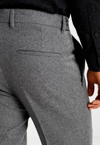 KIOMI Tygbyxor - mottled grey