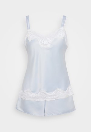 Απαλή μπλε σατέν καμισόλα με δαντέλα κατά μήκος του λαιμού και του στριφώματος. Διαθέτει ρυθμιζόμενες τιράντες spaghetti και σχεδίαση με χαλαρή εφαρμογή.