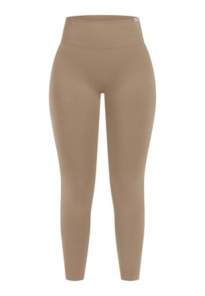 Beige high-waisted leggings gemaakt van gladde, rekbare stof. Ze hebben een aansluitend ontwerp en naadloze benen, wat zorgt voor een slanke uitstraling.