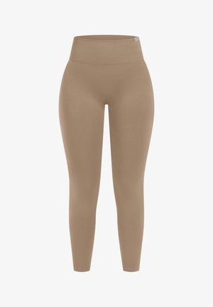 Beige High-Waist-Leggings aus glattem, dehnbarem Stoff. Sie haben ein enganliegendes Design und nahtlose Beine, die ein elegantes Aussehen verleihen.