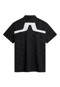 Black short-sleeve polo with a honeycomb texture, featuring a white accent on the back in a geometric design. Crafted from breathable fabric.