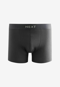 Černé boxerky vyrobené z měkké tkaniny, s širokým elastickým pasem a logem "NEXT" v kontrastní barvě.