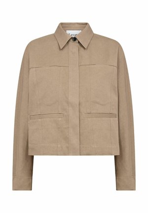 Jachetă bej scurtă cu guler cu nasturi, două buzunare frontale și cusături structurate, realizată dintr-un material rezistent din bumbac mixt.