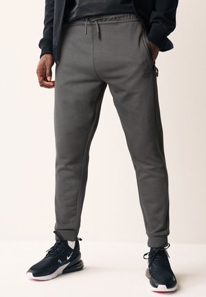 REGULAR FIT - Tracksuit bottoms - slate grey