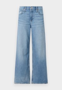 Jeans ampi azzurri realizzati in denim, con vita alta, design a cinque tasche e leggera sfumatura lungo le gambe.