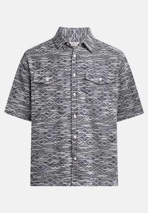 Short-sleeve button-up shirt in black and white with a woven pattern, featuring a chest pocket, classic collar, and smooth fabric texture.