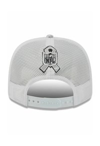 White mesh baseball cap featuring a prominent black NFL logo patch and adjustable snapback closure, with a textured surface.
