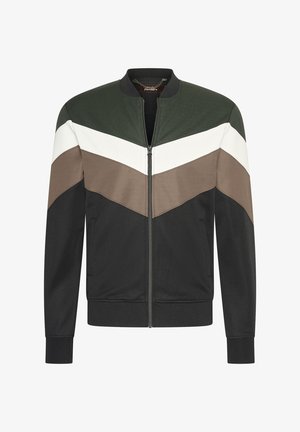 Bomberjack met een groen, wit, bruin en zwart zigzagpatroon. Voorzien van een rits aan de voorkant, geribbelde manchetten en zijzakken. Gladde stoftextuur.