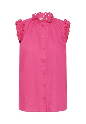 Vaaleanpunainen hihaton paita, jossa on korkea kaula-aukko ja röyhelöreunus. Edessä nappisuljenta; sileä kangas, jossa on kevyt rakenne.