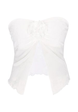 Top alb fără bretele, cu panouri din material transparent și un detaliu floral texturat în partea din față, în centru.